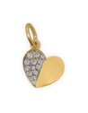 Dettaglio del cuore dorato con zirconi Rue des Mille CharmBar.